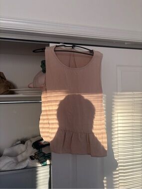 Sleeveless Peplum Shell Top in Blush Pink